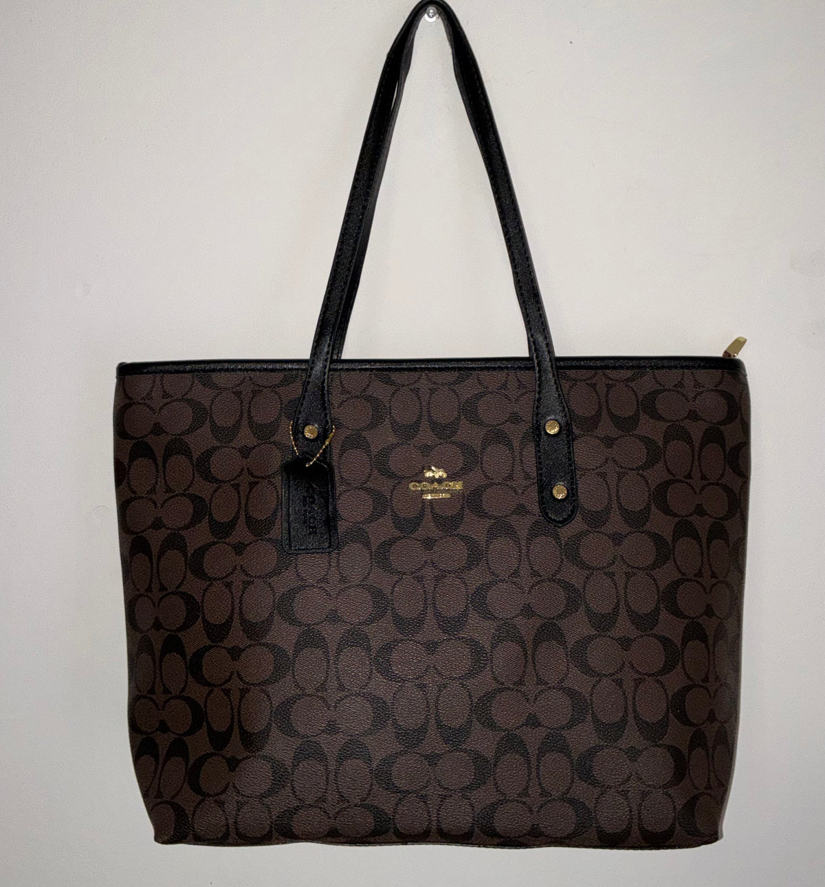 Carteras, Coach